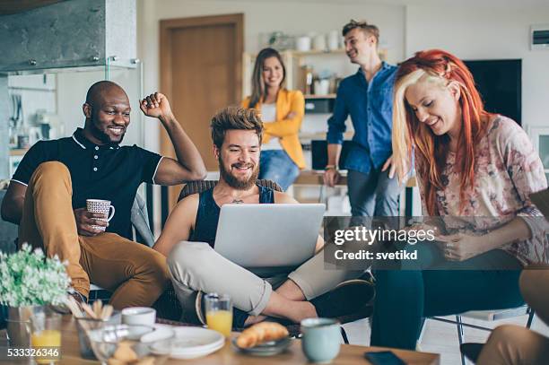 living, working and playing under one roof. - fun student stockfoto's en -beelden