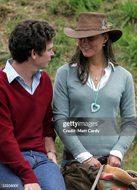 Kate Middleton, girlfriend of Prince William chats with friends and companions in front of the main arena, on the second day of the Gatcombe Park...