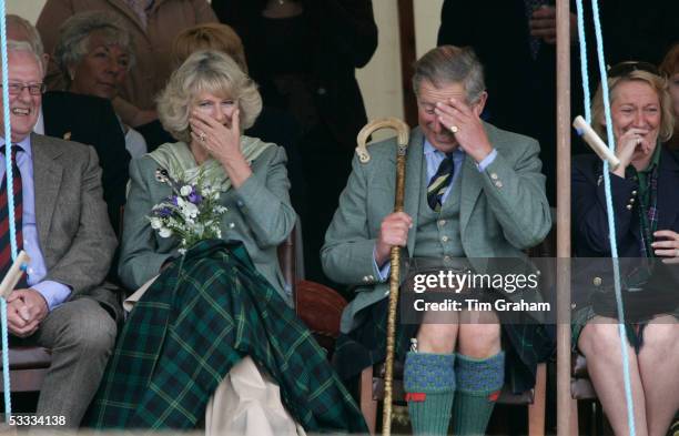 Prince Charles, the Prince of Wales, and his wife Camilla, the Duchess of Cornwall, in their role as the Duke and Duchess of Rothesay, share a laugh...