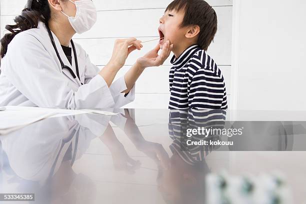 dental surgery - vesicular stomatitis stock pictures, royalty-free photos & images