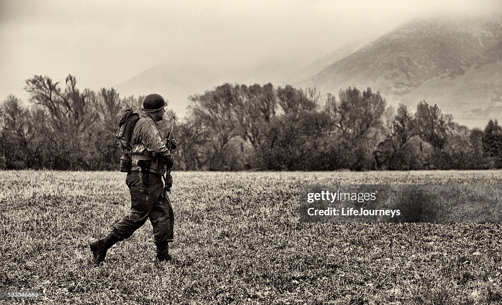 WWII American Soldier On Patrol In The German Countryside