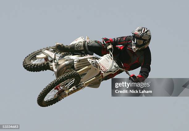 Beau Bamburg performs a trick during the Moto X freestyle final at X-Games Eleven on August 6, 2005 at the Home Depot Center in Los Angeles,...