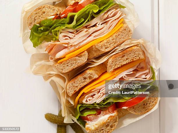 deli style turkey bagel sandwich - cheddar cheese above stock pictures, royalty-free photos & images