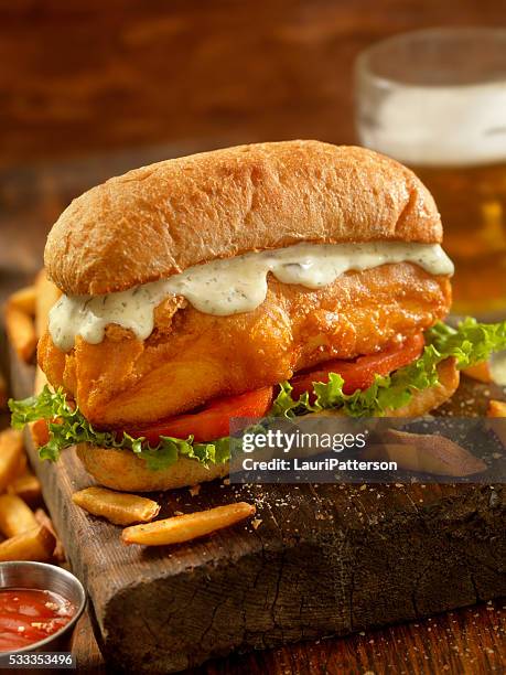 beer battered fish sandwich on a ciabatta bun - crunchy stock pictures, royalty-free photos & images