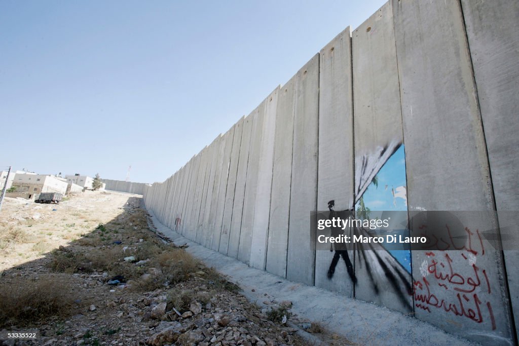 British Guerrilla Artist Decorates West Bank Barrier