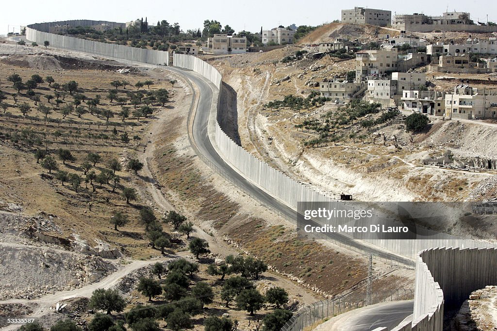 British Guerrilla Artist Decorates West Bank Barrier