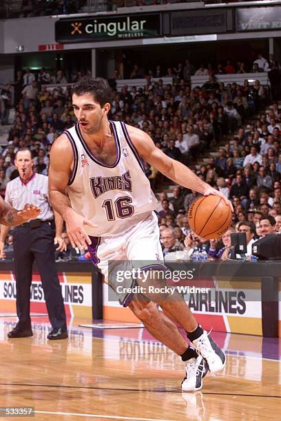 Peja Stojakovic of the Sacramento Kings drives to the basket during the Kings opening night game versus the Seattle SuperSonics at the ARCO Arena in...