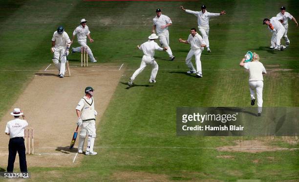 Stephen Harmison of England claims the wicket of Michael Kasprowicz of Australia caught by Geraint Jones of England to give them a two run win during...
