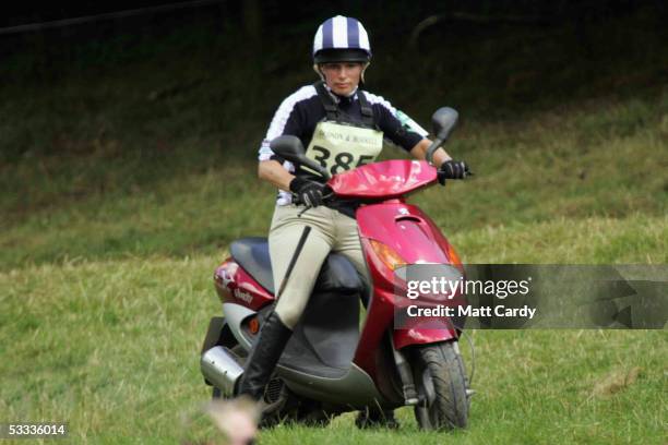 Zara Phillips, daughter of Princess Anne, rides a scooter on the third day of the Gatcombe Park Festival of British Eventing at Gatcombe Park, on...