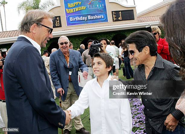 Actor Kevin Costner , former jockey Laffit Pincay and son Jean-Laffit Pincay pose at the premiere of "Laffit: All About Winning", a documentary...