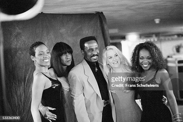 Ike Turner, vocals and guitar, poses with the Ikettes at the Paradiso on May 17th 1995 in Amsterdam, the Netherlands.