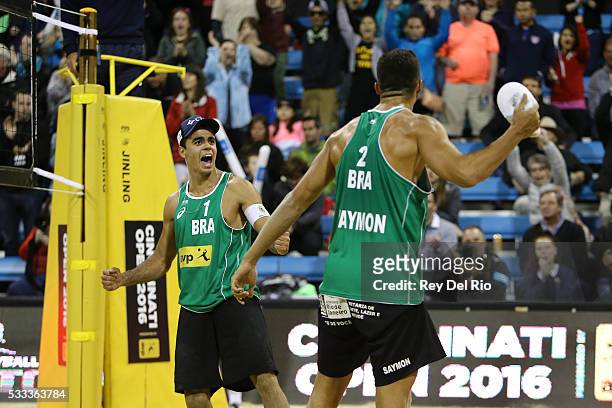 Gustavo Carvalhaes and Saymon Barbosa of Brazil celebrate after defeating Josh Binstock and Sam Schachter of Canada in the Gold medal match during...