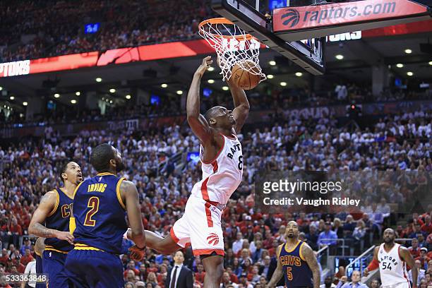 Bismack Biyombo of the Toronto Raptors dunks the ball during the second half against the Cleveland Cavaliers in game three of the Eastern Conference...