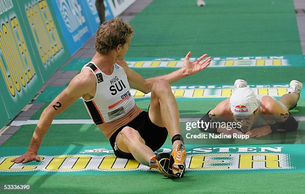 Reto Hug and Sven Riederer of Swizterland complete the Holsten City Man Elite Triathlon on August 7, 2005 in Hamburg, Germany.