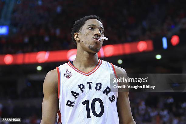DeMar DeRozan of the Toronto Raptors reacts during the second half against the Cleveland Cavaliers in game three of the Eastern Conference Finals...
