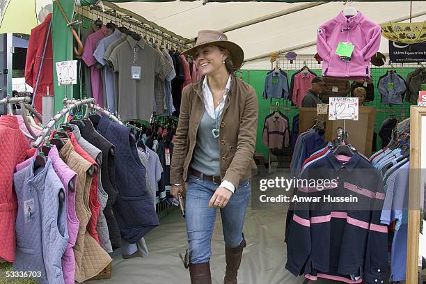 Kate Middleton, girlfriend of Prince William, does some shopping when she attends the second day of the Gatcombe Park Festival of British Eventing at...