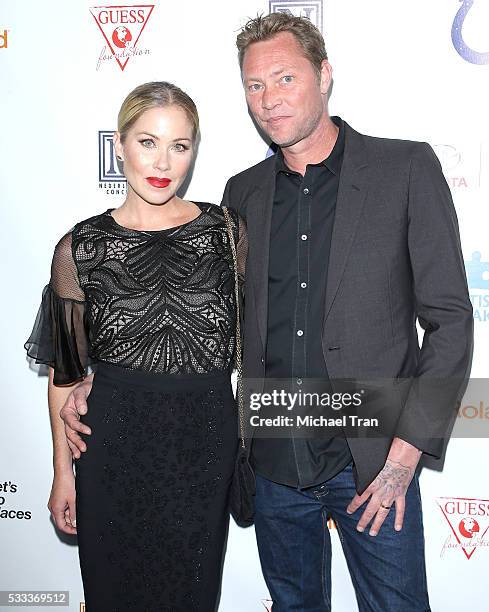 Christina Applegate and Martyn LeNoble arrive at the 4th Annual Light Up The Blues held at the Pantages Theatre on May 21, 2016 in Hollywood,...