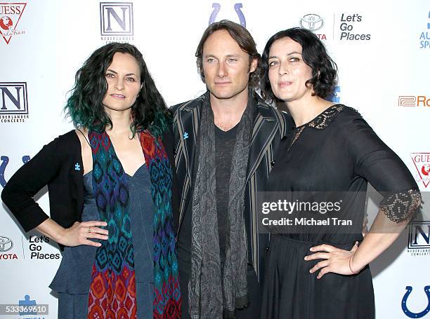 Rain Phoenix, Chris Stills and Frally Hynes arrive at the 4th Annual Light Up The Blues held at the Pantages Theatre on May 21, 2016 in Hollywood,...