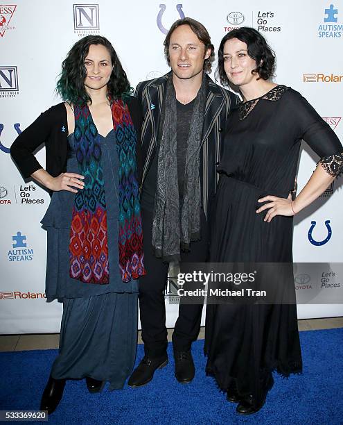 Rain Phoenix, Chris Stills and Frally Hynes arrive at the 4th Annual Light Up The Blues held at the Pantages Theatre on May 21, 2016 in Hollywood,...