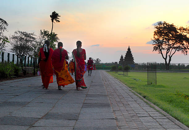 tourists walking towards shore temple mahabalipura - mamallapuram. stock pictures, royalty-free photos & images
