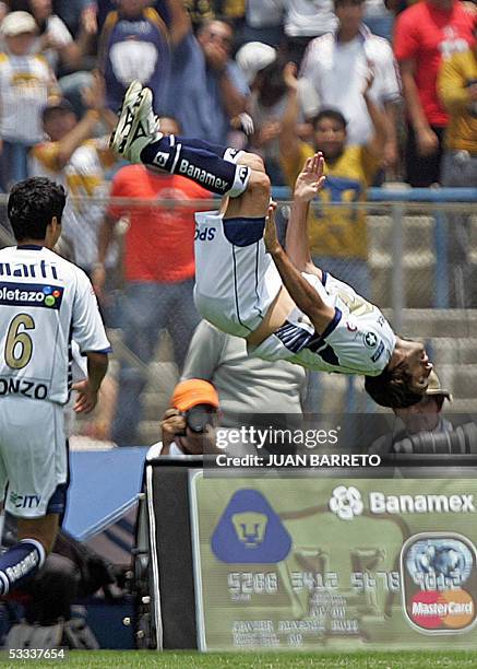 El argentino Bruno Marioni de Pumas, festeja despues de anotar un gol al equipo de Pumas, durante el partido de la segunda semana del Torneo Apertura...