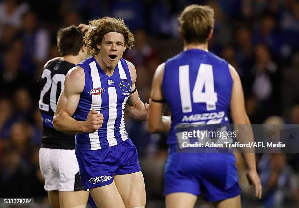 Ben Brown of the Kangaroos celebrates a goal with Trent Dumont of the Kangaroos during the 2016 AFL Round 09 match between the North Melbourne...