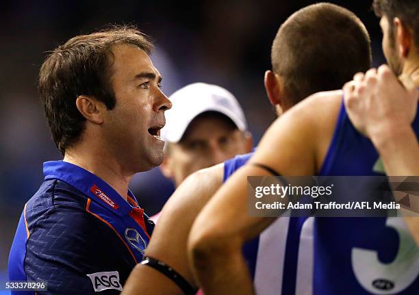 Brad Scott, Senior Coach of the Kangaroos addresses his players during the 2016 AFL Round 09 match between the North Melbourne Kangaroos and the...