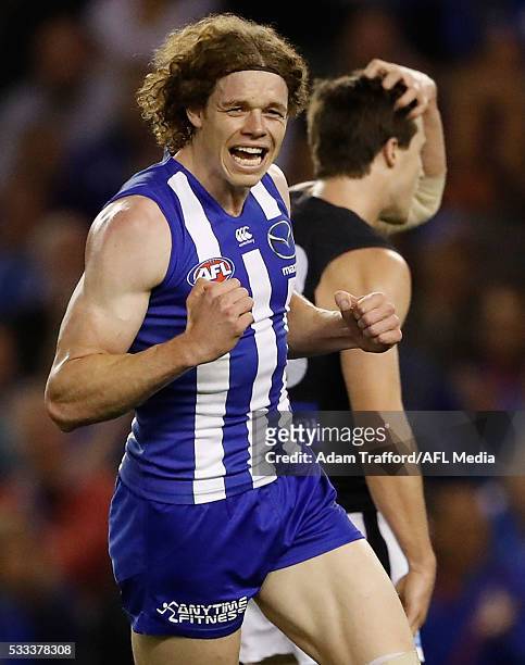 Ben Brown of the Kangaroos celebrates a goal during the 2016 AFL Round 09 match between the North Melbourne Kangaroos and the Carlton Blues at Etihad...