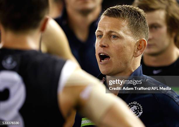 Brendon Bolton, Senior Coach of the Blues addresses his players during the 2016 AFL Round 09 match between the North Melbourne Kangaroos and the...