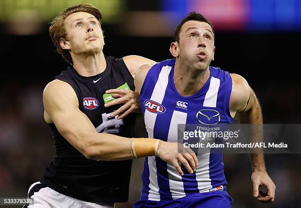 Daniel Gorringe of the Blues and Todd Goldstein of the Kangaroos compete in a ruck contest during the 2016 AFL Round 09 match between the North...