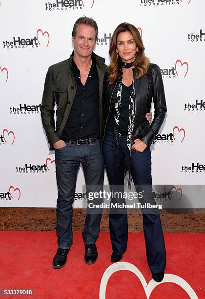 Randy Gerber and supermodel Cindy Crawford attend The Heart Foundation's Honoring of Mike Meldman at Ron Burkle's Green Acres Estate on May 21, 2016...