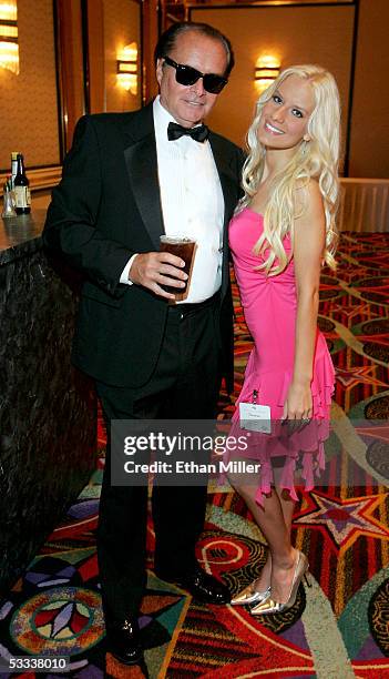 Jack Nicholson impersonator, Roger Johnson of Ohio and Jessica Simpson impersonator, Christina Shaw of Pennsylvania pose during opening night of the...