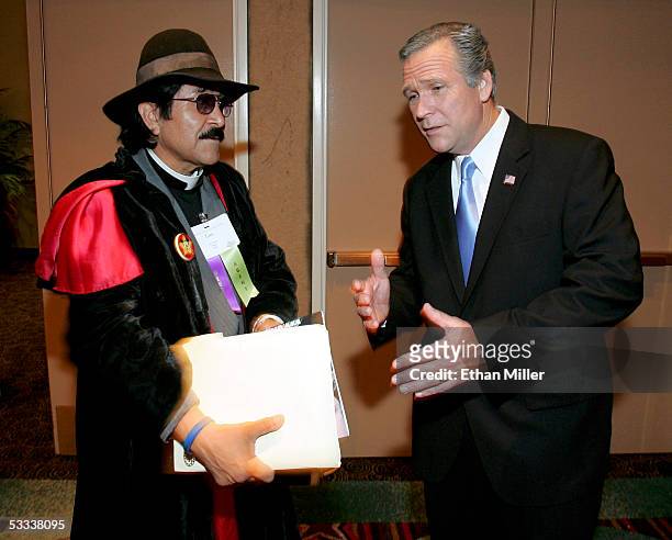 Father Guido Sarducci impersonator, Lico Reyes of Texas and President George W. Bush impersonator, John Morgan of Florida, talk during the opening...