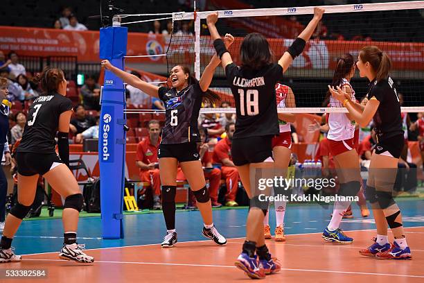 Players of Thailand celebrate a win during the Women's World Olympic Qualification game between Thailand and Peru at Tokyo Metropolitan Gymnasium on...