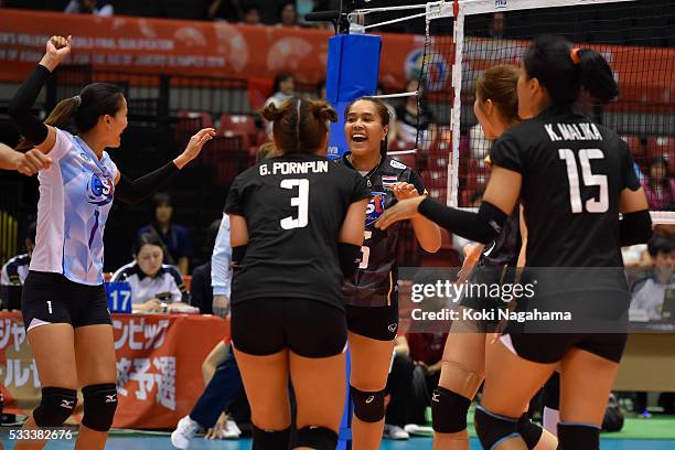 Players of Thailand celebrates a point during the Women's World Olympic Qualification game between Thailand and Peru at Tokyo Metropolitan Gymnasium...