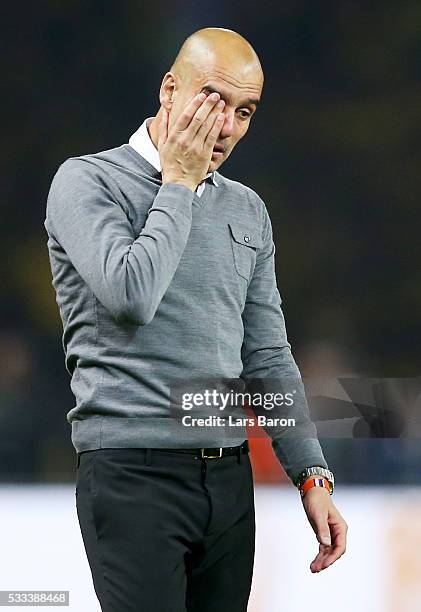 Head coach Josep Guardiola cries after winning the DFB Cup Final 2016 between Bayern Muenchen and Borussia Dortmund at Olympiastadion on May 21, 2016...