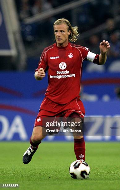 Marco Engelhardt of Kaiserslautern runs with the ball during the Bundesliga match between Schalke 04 and 1.FC Kaiserslautern at the Arena Auf Schalke...