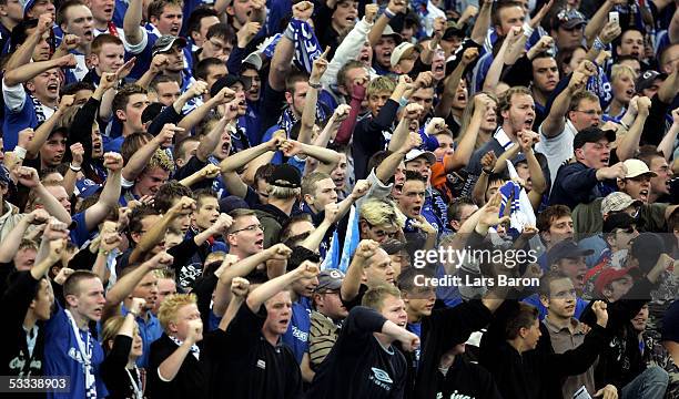 Some fans of Schalke react during the Bundesliga match between Schalke 04 and 1.FC Kaiserslautern at the Arena Auf Schalke on August 7, 2005 in...