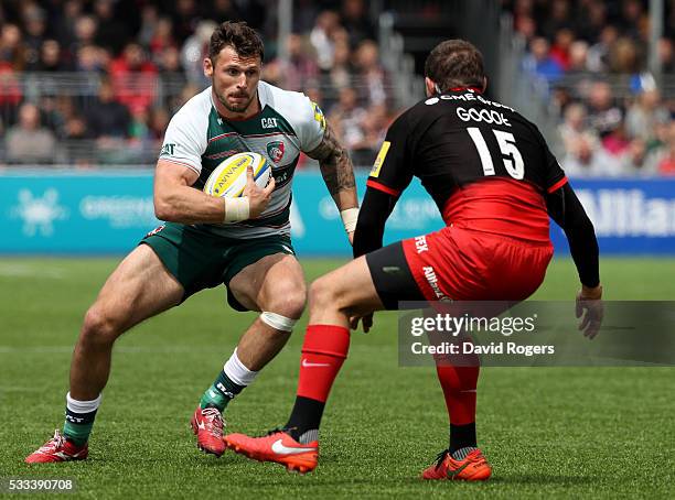 Adam Thompstone of Leicester takes on Alex Goode during the Aviva Premiership semi final match between Saracens and Leicester Tigers at Allianz Park...