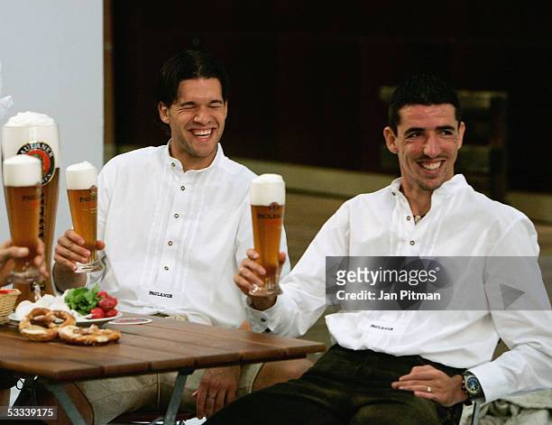 Michael Ballack, L, and Roy Makaay, pose for photographers during a photo session of Bayern Munich on August 8, 2005 in Munich, Germany. Bayern...