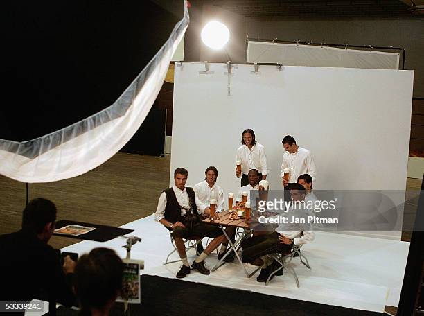 Valerien Ismael, Claudio Pizarro, Roque Santa Cruz, , Ze Roberto, Lucio, Michael Ballack and Roy Makaay sit in a photo studio during a photo session...