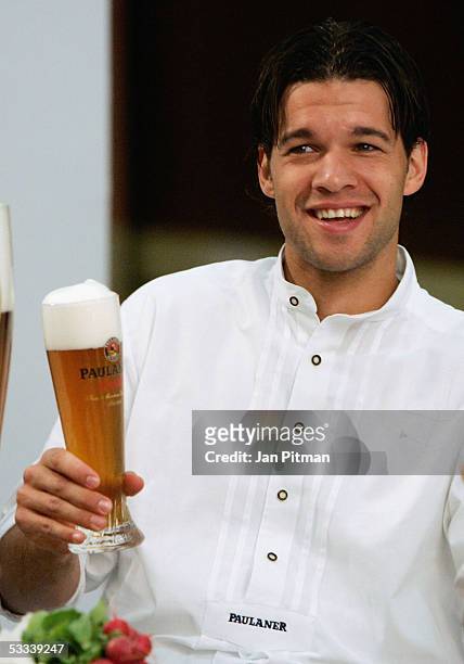 Michael Ballack smiles with a beer in his hand during a photo session of Bayern Munich on August 8, 2005 in Munich, Germany. Bayern Munich Team are...