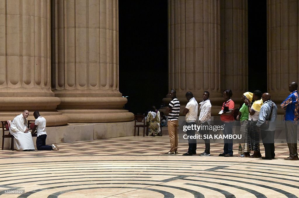 Confesse Queue Catholic pilgrims queue to confess to a priest at the Our Lady of the ...