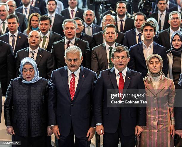 Turkey's PM Ahmet Davutoglu and his wife Sare Davutoglu , Transport and Comunication Minister Binali Yildirim and his wife Semiha Yildirim stand up...