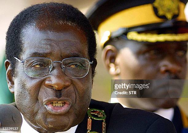 Zimbabwean President Mugabe addresses a speech at the Heroes Day ceremony commemorating those who died in Zimbabwe's war for independence 08 August...