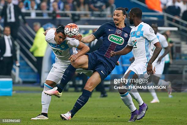Paris Saint-Germain's Swedish forward Zlatan Ibrahimovic vies with Marseille's Dutch defender Karim Rekik during the French Cup final football match...