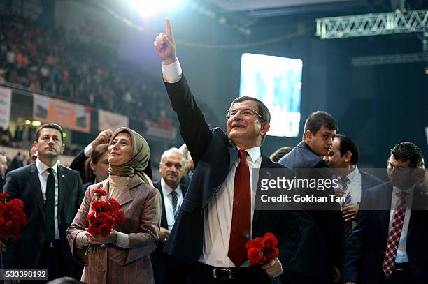 Turkey's outgoing Prime Minister Ahmet Davutoglu waves to the supporters during the Extraordinary Congress of the ruling AK Party to choose the new...