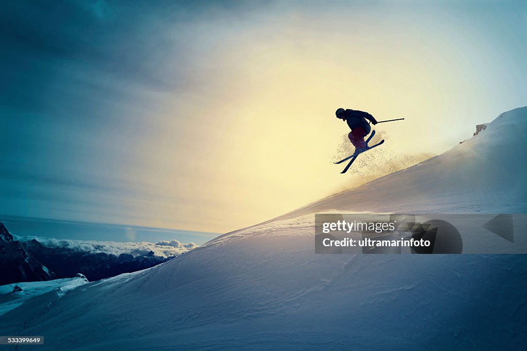 Extreme Freestyle snow skier jumping Off pist back country skiing