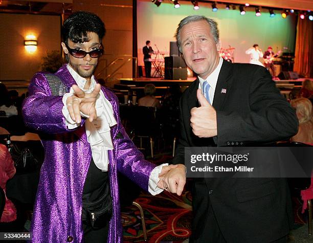 Prince impersonator Jason Tenner of Nevada and President George W. Bush impersonator John Morgan of Florida pose during the opening night of the...
