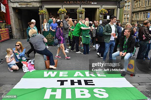 Hibernian supporters gather on the Royal Mile awaiting the teams victory parade to celebrate yesterdays historic Scottish Cup final win over Rangers...